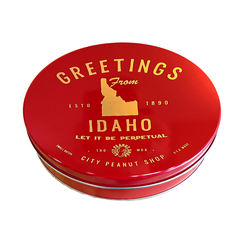 "GREETINGS FROM IDAHO" LET IT BE PERPETUAL TIN • LARGE RED/GOLD 7-SECTION